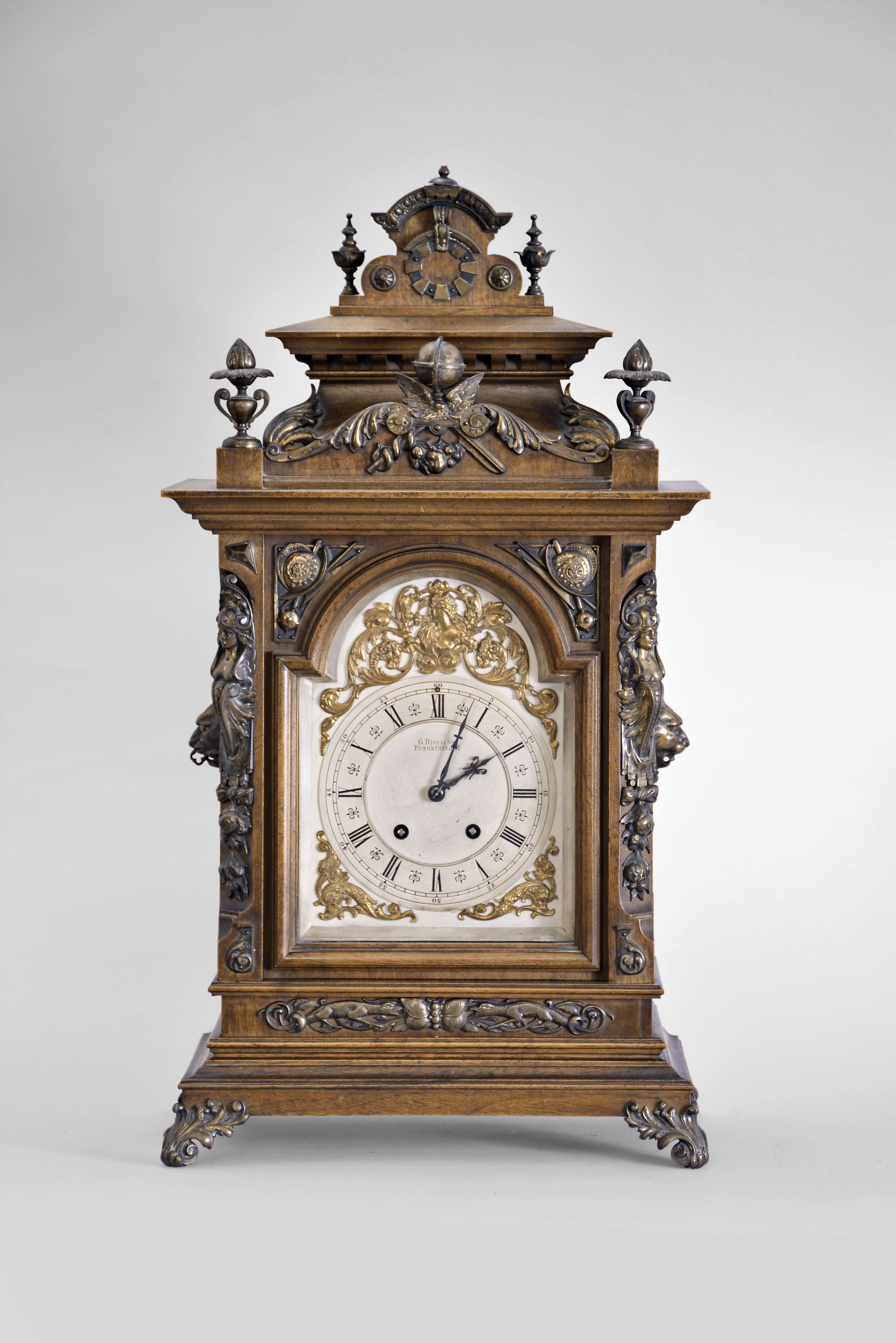 Actiengesellschaft fur Uhrenfabrikation, Lenzkirch, "No. 182", 8 day, time and strike spring brass movement bracket clock. "1 Million" Serial No. 16284. An example of the clock can be found in: "Lenzkirch Clocks, The Unsigned Story" by George Everett, Pg. 100 and in "Lenzkircher Uhren" Pg. 80. — Antique Clocks Price Guide
