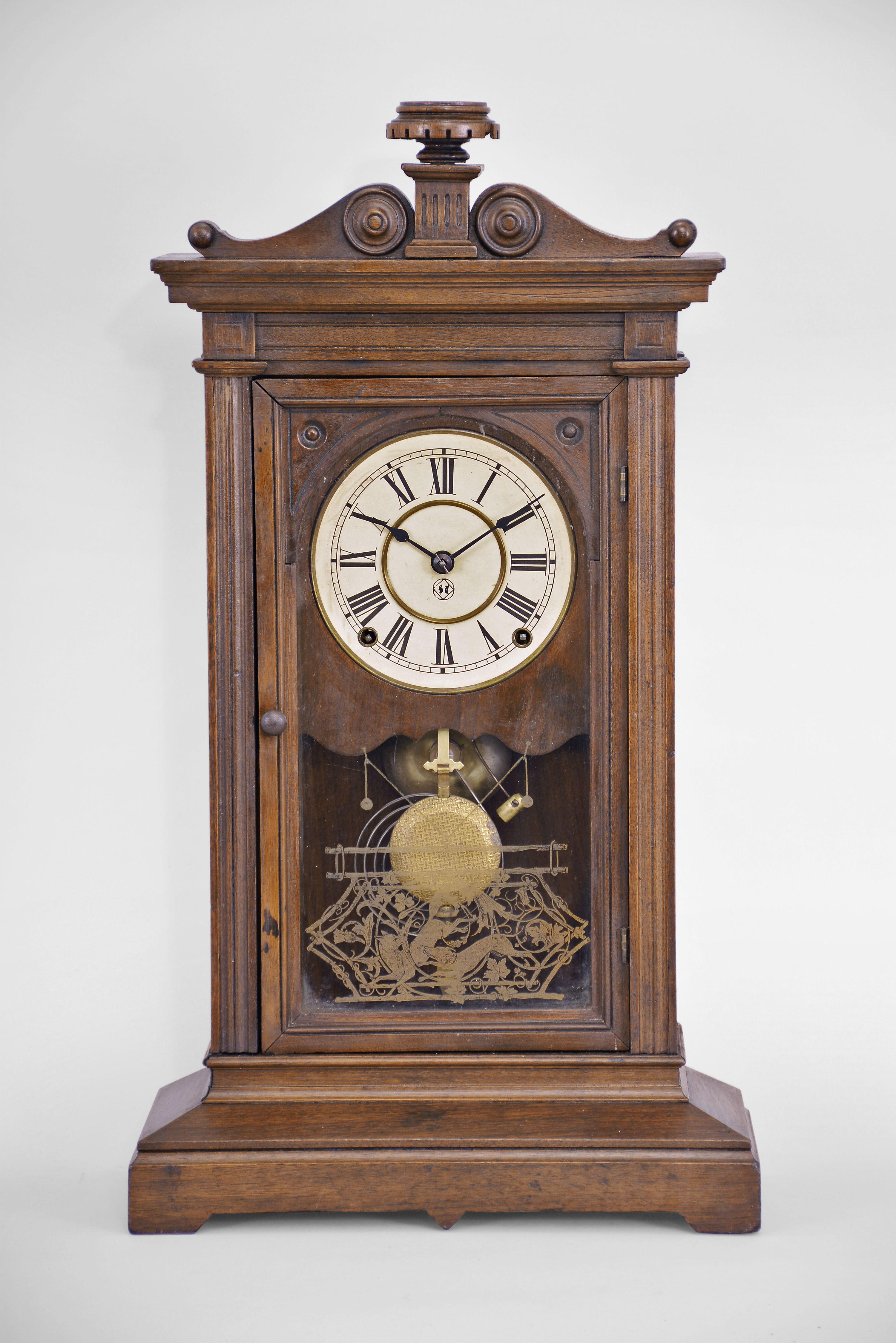 Seth Thomas Clock Co., Thomaston, Conn., "Greek VP" shelf clock with a spring driven 8 day time and strike lyre movement in a walnut case. — Antique Clocks Price Guide