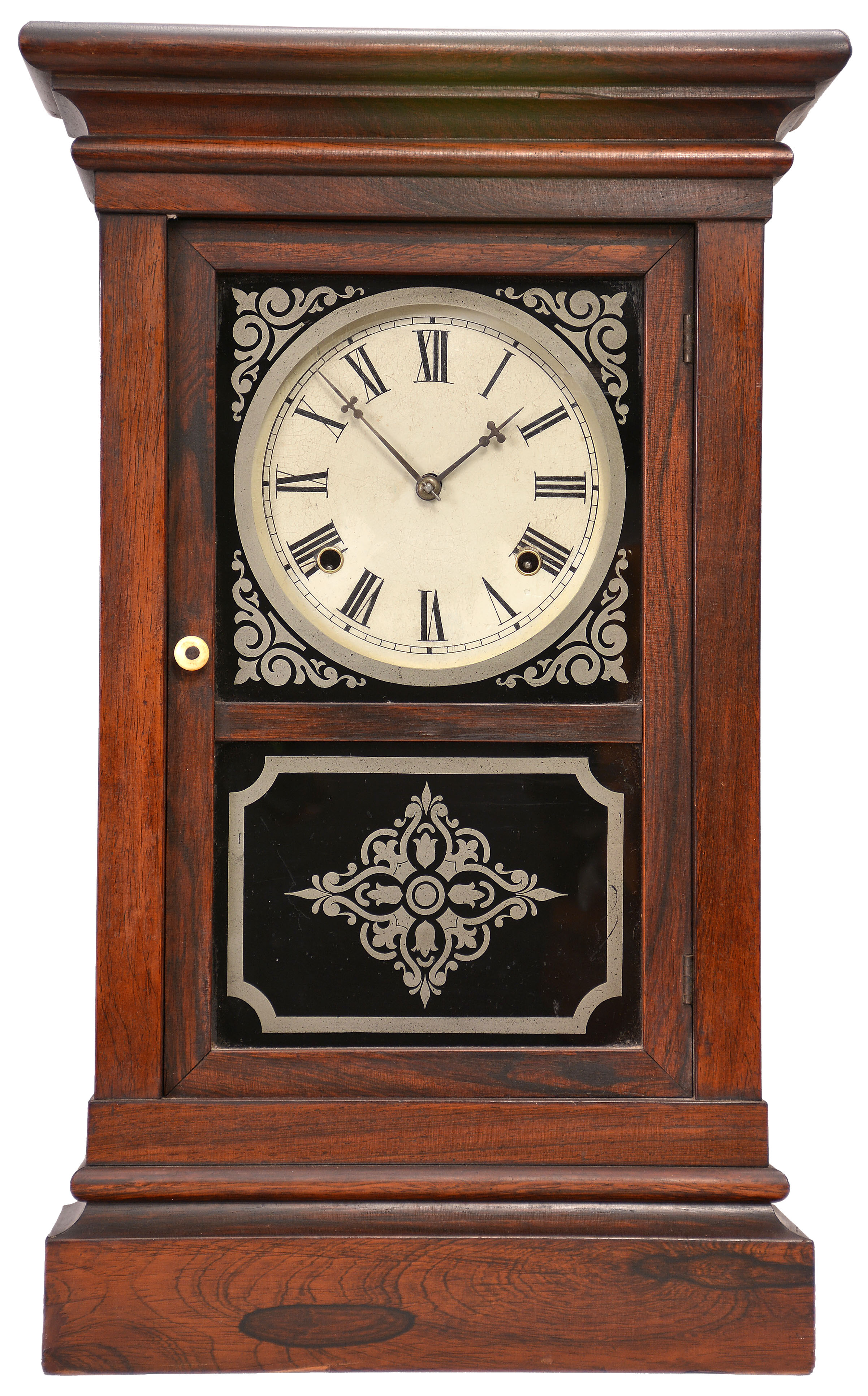Clocks- 2 (Two): (1) Waterbury Clock Co., Waterbury, Conn. unidentified cornice top shelf clock with a spring driven 8 day time and strike movement in a rosewood veneered case. c1865; (2) Ansonia Clock Co., New York., "Dolphin" crystal regulator with a spring driven 8 day time and half hour strike movement in a polished brass and beveled glass case. c1914. — Antique Clocks Price Guide
