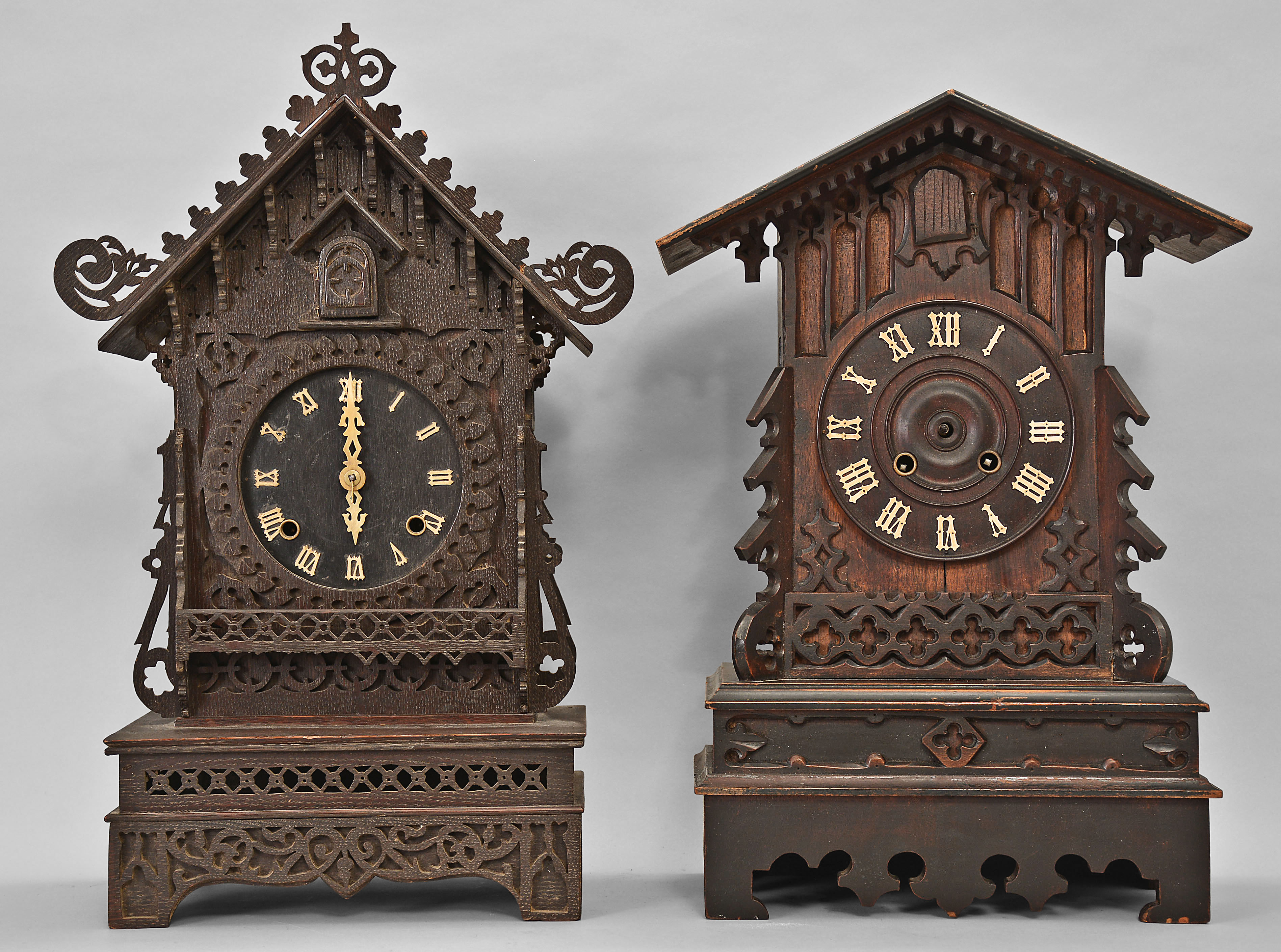Clocks- 4 (Four) Cuckoo: (1) Scarce A. Frankfeld and Co., New York, shelf cuckoo, 8 day, time and strike with cuckoo bird, modified spring driven Waterbury movement in a fretwork case, c1870; (2) Gordian Hettich & Sohn, Furtwangen, Germany, shelf cuckoo, 8 day, time and strike with cuckoo in carved wood case, c1890; (3) Philipp Haas & Sohne, St. Georgen, Germany, cuckoo clock, 30 hour, time and strike with cuckoo, c1906; (4) American Cuckoo Clock Co, Philadelphia, cuckoo clock, 30 hour, time and strike with cuckoo in a carved wood case, c1910. — Antique Clocks Price Guide