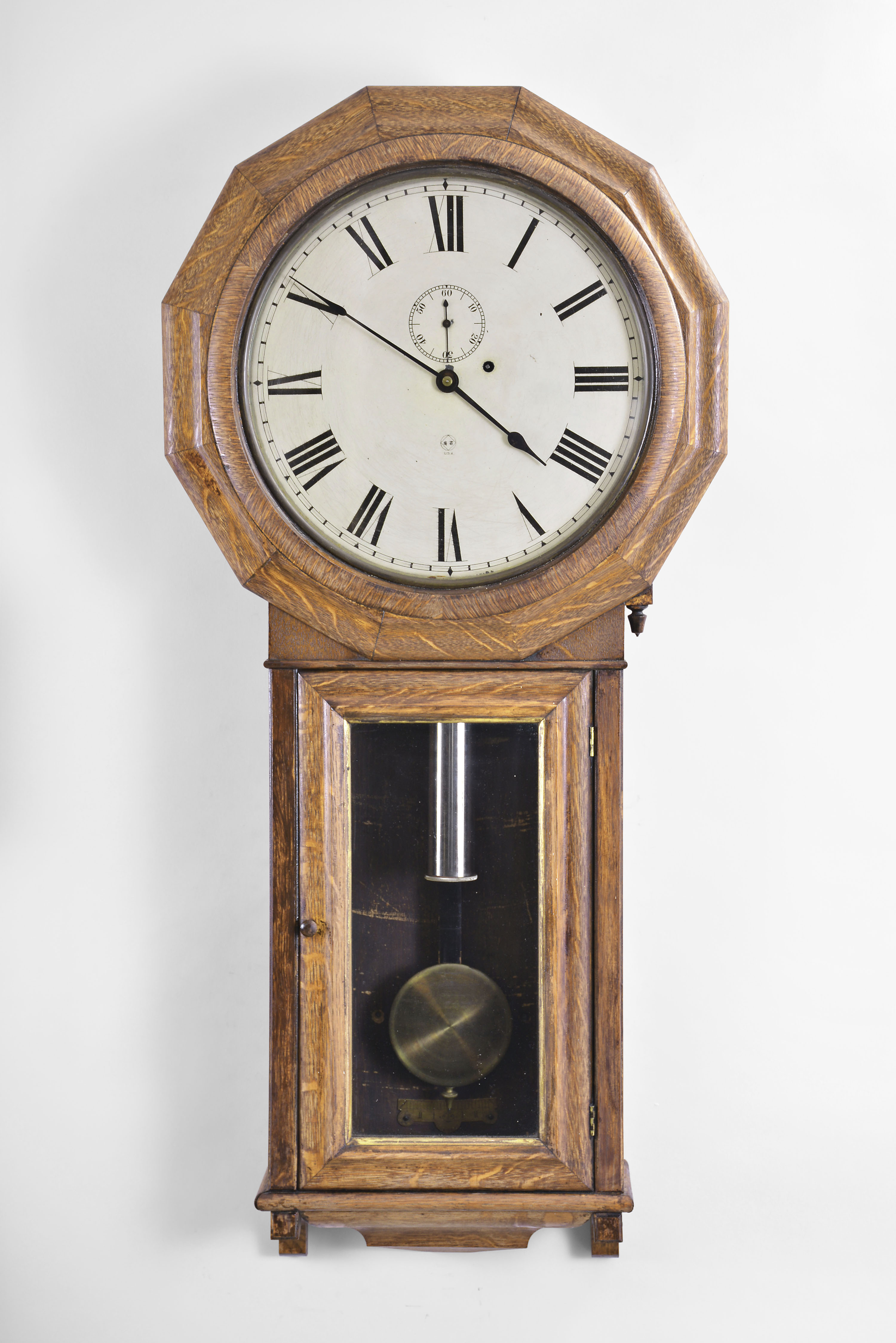 Seth Thomas Clock Co., Thomaston, Conn., "Regulator No. 3" wall clock with a weight driven 8 day timepiece movement in an oak case. — Antique Clocks Price Guide