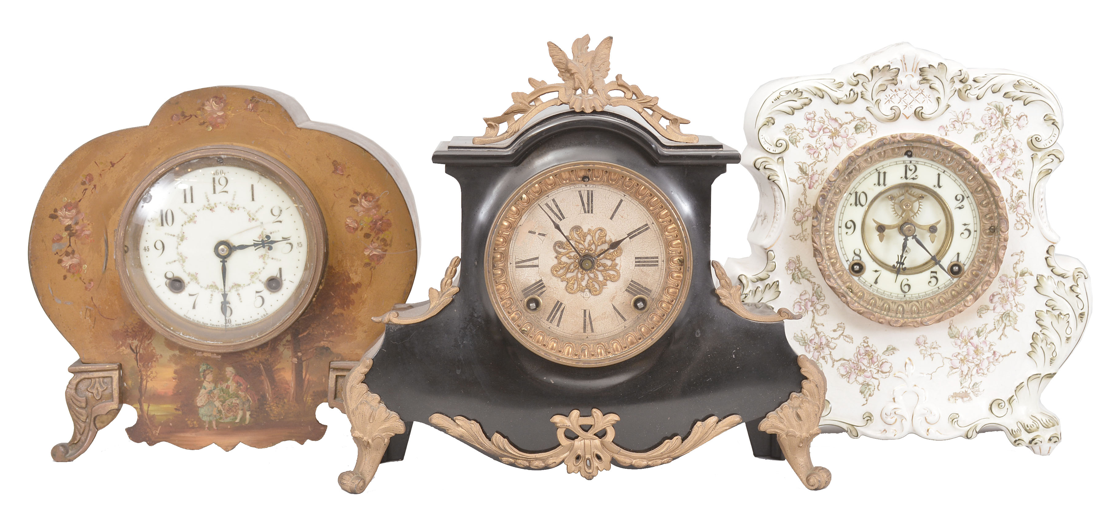 Clocks- 8 (Eight): assorted clocks including a disc pendulum 400-day clock by Becker, two porcelain case clocks by Ansonia, an enameled iron case clock by Ansonia, A "Royal Geographical Society World Clock", an 1892 wooden Columbus clock, a painted iron case clock by New Haven, and a 400 day clock signed by Endura. Also included in the lot are parts to two additional 400 day clocks. — Antique Clocks Price Guide
