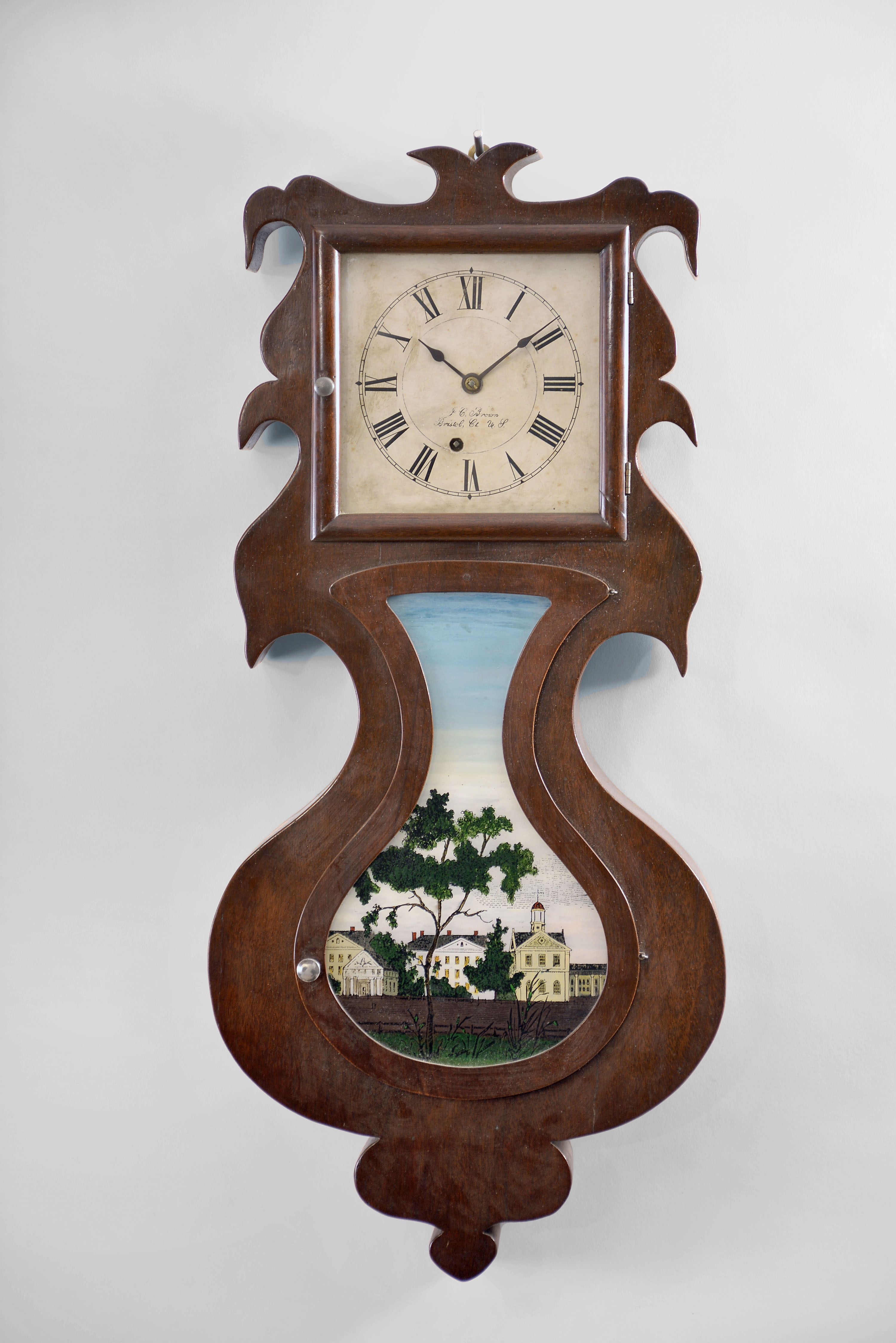 Copy of a J. C. Brown, Forestville Mfg. Co., Bristol, Conn., 8 day, spring brass movement wall lyre timepiece. — Antique Clocks Price Guide