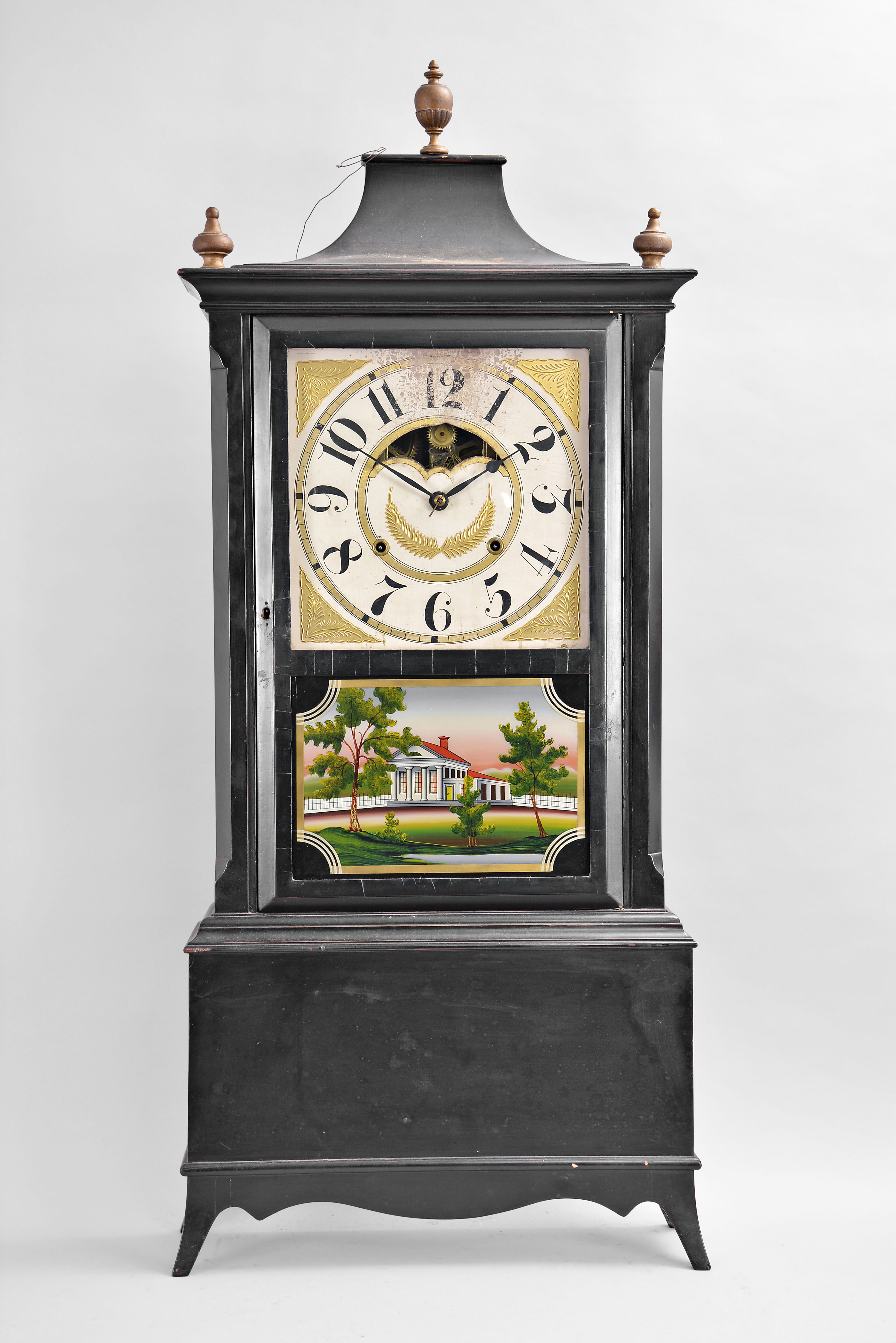 An old shelf clock case, perhaps Colonial Revival or earlier, now fitted with a Birge, Mallory & Co., Bristol, Conn., 8 day, time and strike weight strap brass movement, c1840. — Antique Clocks Price Guide