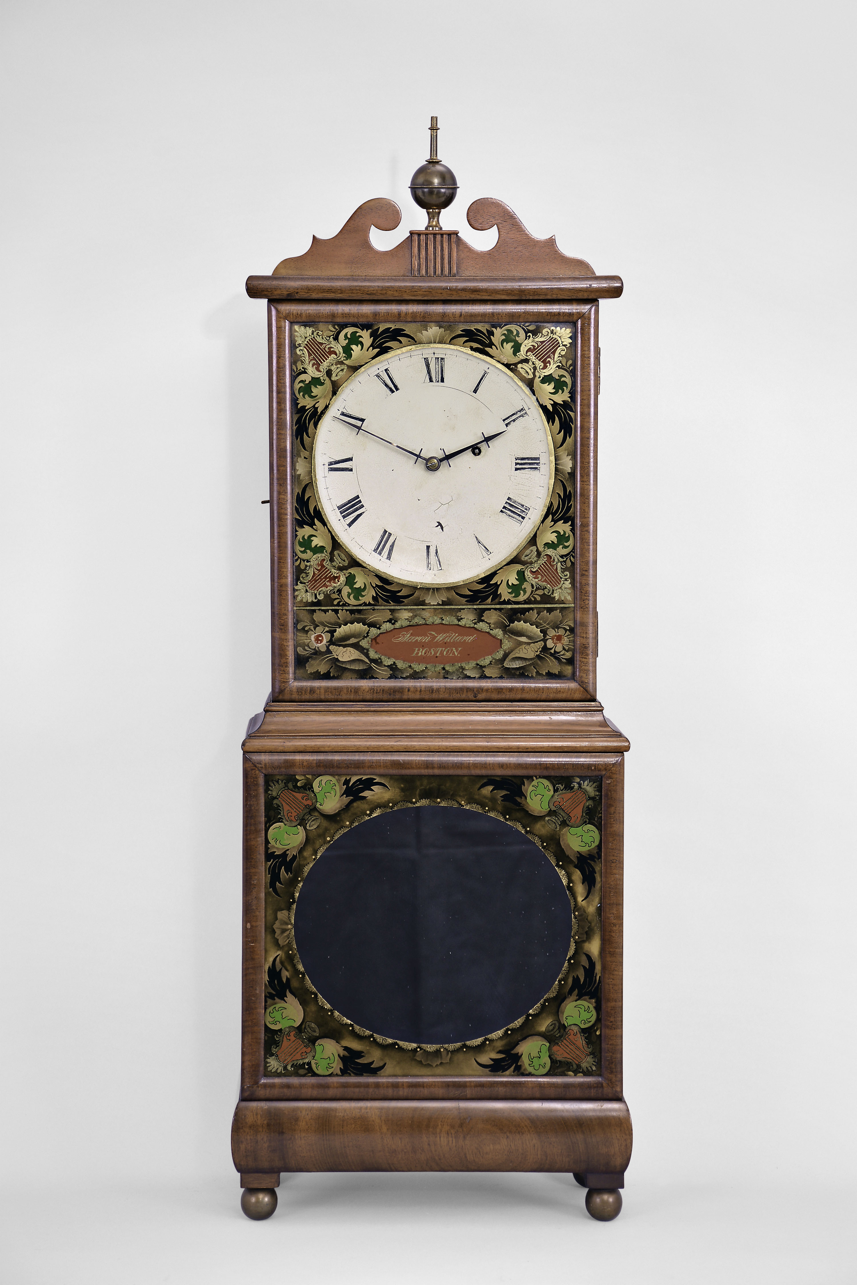 Aaron Willard, Boston, Massachusetts shelf clock, 8 day, time only, weight driven movement in a mahogany case with painted metal dish dial with reverse painted upper and lower tablets surmounted by brass finial — Antique Clocks Price Guide