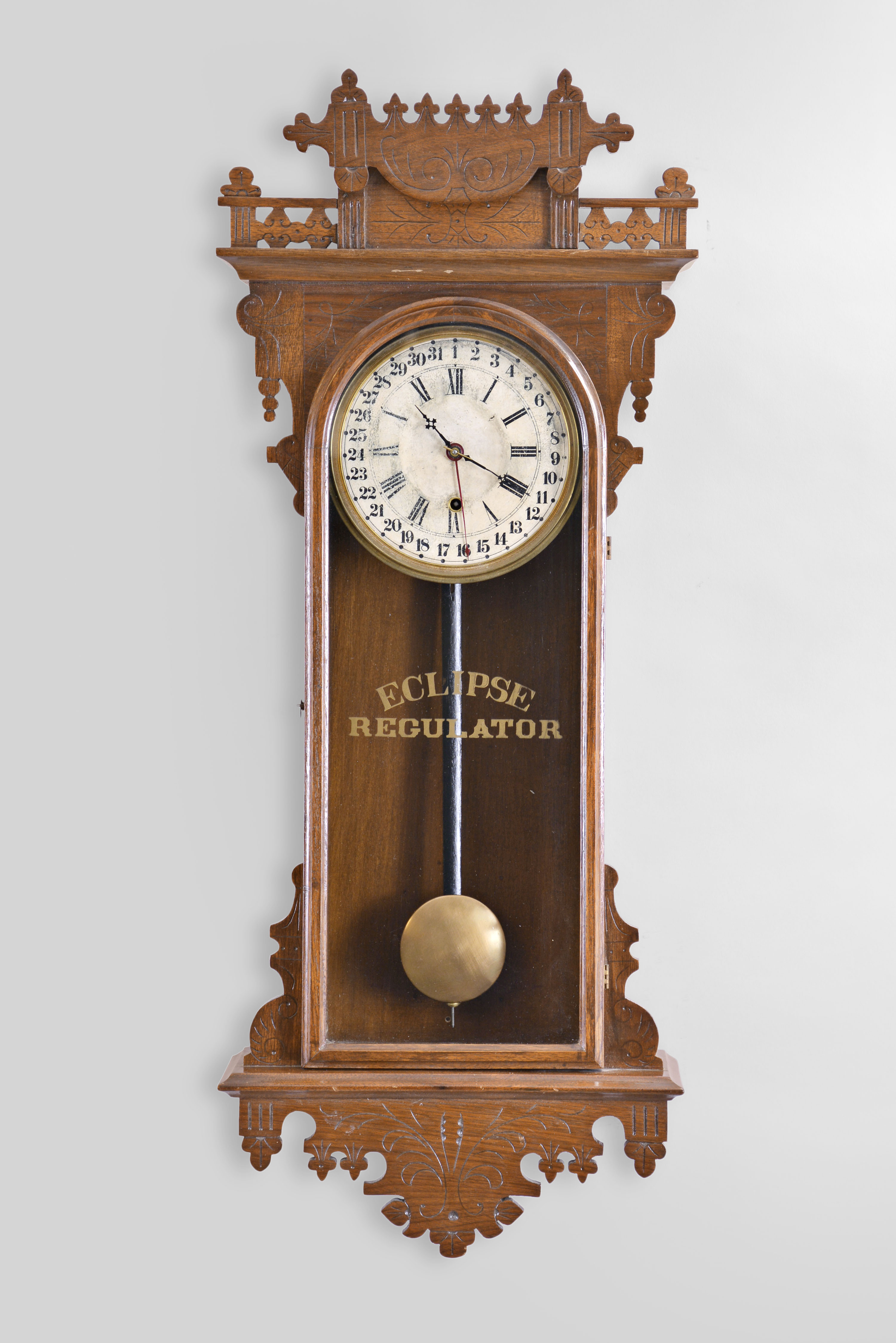 E. N. Welch Mfg. Co., Forestville, Conn., "Eclipse", 8 day, spring brass movement with calendar regulator wall clock. This clock was made for the Metropolitan Manufacturing Co., New York. — Antique Clocks Price Guide