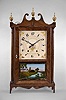 Wadsworth, Lounsbury & Turner, Litchfield, Conn., 30 hour, time and strike weight wood movement pillar & scroll shelf clock with a Riley Whiting label.