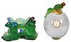 Clocks- 3 (Three): two Bulova "Accutron", both with cal. 214 movements and gilt metal cases, the other a Daum "Frog with Golden Eyes", green glass base with two frogs supporting a transparent glass ovate "case", set with a small quartz timepiece, and surmounted by another green glass frog