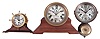 Clocks- 3 (Three) Seth Thomas Marine: (1) Seth Thomas, Thomaston, Conn., "Merrimac" ship's clock, 30 hour, time and ship's strike, spring-driven balance wheel movement in a brass case with hinged bezel on a wood stand, c1935; (2) Seth Thomas, Thomaston, Conn., "Ship's Bell", 30 hour, time and and ship's strike, spring-driven balance wheel movement in nickel plated case with outside bell, c1884; (3) Seth Thomas, Thomaston, Conn., "Clipper" marine clock, 8 day, time only, spring-driven balance wheel movement with yacht wheel bezel on a mahogany base, c1936.