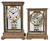 Clocks- 2 (Two ) Crystal Regulators: (1) Seth Thomas, Thomaston, Conn., "Empire No. 13" crystal regulator, 8 day, time and strike, spring-driven round movement in a glazed brass case with white enamel dial and double-vial pendulum, c1907; (2) Seth Thomas, Thomaston, Conn., "Empire no. 200" crystal regulator, 8 day, time and strike, spring-driven round movement in a glazed brass case with silvered dial and double-vial pendulum, c1928.