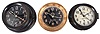 Clocks- 3 (Three) Chelsea Naval Clocks: (1) Chelsea Clock Co., Boston for U.S. Navy "Mark I, Deck Clock", 8 day, time only, spring-driven balance wheel movement with rear wind and set in a black phenolic case with mounting plate, serial 51328, dated 1943; (2) Chelsea Clock Co., Boston for U.S. Navy "Mark I, Deck Clock", 8 day, time only, spring-driven balance wheel movement with rear wind and set in a heavy brass case, serial 12999, dated 1941; (3) Chelsea Clock Co., Boston for U.S. Maritime Commission "Model 12E Deck Clock", 8 day, time only, spring-driven balance wheel movement with center seconds in a black phenolic case, serial 409424, c1943