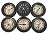 Clocks- 6 (Six) Seth Thomas Marine Clocks: Seth Thomas Clock Co., Thomaston, Conn., for U.S. Maritime Commission, five being 8 day, time only wardroom or engine room clocks with center seconds on 5.5 inch silvered dials in black phenolic cases with hinged bezels, the last being a time and ship's stirke clock in a black phenolic case with black dial.