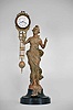German, Junghans "Diana" figural 8 day, cast metal swinging arm novelty time-only mantel clock.