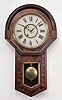 New Haven Clock Co., New Haven, Conn., "Imperial" wall clock, 8 day, time only, spring driven movement in a rosewood veneered case with painted metal dial.