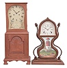 Clocks- 2 (Two): (1) Unknown, Mass.-style shelf clock reproduction, 8 day, time and strike, spring driven German movement in a handmade pine case, c1980; (2) Unknown, reproduction of acorn shelf clock originally produced by Forestville Manufacturing Co., 8 day, time and strike, spring driven movement in a walnut case, c1990.