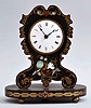 New Haven Clock Co., New Haven, Conn. for Coe & Co., New York, shelf timepiece, 30 hour, time only, spring driven movement with Samuel N. Botsford's patent lever escapement on a wood base with paper mache front.