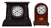 Clocks- 2 (Two): (1) Vincenti & Cie., Paris, mantel clock, 8 day, time and strike, spring driven pendule de Paris movement in a black slate case with Egyptian-style columns, c1880; (2) France, round top mantel clock, 8 day, time and strike, spring driven pendule de Paris movement in a walnut case with inlay, c1910.