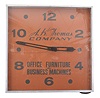 Modern Clock Advertising Co., Brooklyn, New York, outdoor store advertising clock, 120v AC electric motor-driven movement in an aluminium housing, the acrylic dial reading "A.K. Thomas Company / Office Furniture / Business Machines ".
