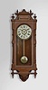 Ansonia Clock Co., New York, "Queen Elizabeth", 8 day, time only, spring driven movement in an oak case.