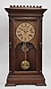 Wm. L. Gilbert Clock Co., Winsted, Conn., "Latona" mantel clock, 8 day, time and strike, spring driven movement in a walnut case.