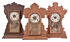 Clocks- 5 (Five) mantel, time and strike with alarm, spring driven movements: (1) Wm. L. Gilbert Clock Co., "Capitol No. 43" mantel, 8 day movement in an oak case, c1904; (2) E. Ingraham, "Cuyuga", 8 day movement in an oak case, c1915; (3) Seth Thomas Clock Co., "Yale", 8 day movement in an oak case, c1909; (4) Waterbury Clock Co., "Suffolk", 8 day movement in a walnut case, 1891; (5) Seth Thomas Clock Co., unknown model, 30 hour in a rosewood veneer case, c1890.