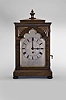 Thomas Cox Lavory, 47 Cornhill, London, mantel timepiece, 8 day, time only with pull alarm, spring driven fusee movement in a rosewood veneered case of Gothic design with stepped molded base and top, applied wood ornaments on the door front with foil arch window, silvered dial engraved as above, Roman numeral dial, and blued steel moon hands.