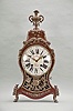 Switzerland, a late 18th century Neuchateloise bracket clock, the red, hardwood case and bracket with painted floral ornament, the bracket with polychrome musical trophy, and with foliate, repousse mounts, and top with cast bronze urn finial, faux thirteen piece enamel dial, eight day movement with rectangular plates, rear mounted strike work, crown wheel escapement, silk thread suspension, and Dutch striking on two bells, the back plate marked "FRFC 689 "
