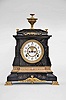 Ansonia Clock Co., New York, 8 day, time and strike spring brass movement enameled iron case mantel clock. We could not find this model in the catalog.