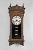 Waterbury Clock Co., Waterbury, Conn., "Peoria", 8 day, spring brass movement roller calendar clock.
