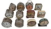 Clocks- 12 (Twelve) Alarm: assortment of antique alarm clocks including several old advertising clocks, two which control gas valves mounted to their tops, a Mickey Mouse clock, and four with simple animated scenes on their dials.