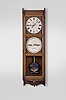 Seth Thomas Clock Co., Thomaston, Conn., "Office Calendar No. 9" wall clock, 8 day, time and perpetual calendar, weight driven movement beating seconds in a cherry case with painted metal dials and seconds bit.