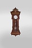 Wm. L. Gilbert Clock Co., Winsted, Conn., "Regulator No. 16 Hanging" jeweler's regulator, 8 day, time only, weight driven movement with deadbeat escapement, maintaining power, sweep seconds and three vial mercury pendulum in a cherry case with Egyptian mask on pediment and white enamel dial