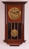 Clocks- 2 (Two): (1) German, 8 day, time and strike spring brass movement wall clock. Movement is stamped "PSI ". c1910 (2) New Haven Clock Co., New Haven, Conn., "Vamoose", 8 day, spring brass movement wall timepiece. c1911