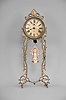 Ansonia Clock Co., New York, "Jumper No. 2" bobbing doll novelty timepiece, 30 hour, time only, spring driven movement that powers the clock and bouncing bisque doll, cast metal stand, 4 inch paper dial.