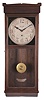 Clocks- 2 (Two) wall: (1) New Haven Clock Co., New Haven, Conn., "No. 3043" wall clock, 8 day, time only, spring driven movement in a mahogany finish case, c1917; (2) Self-winding Clock Co., New York, "No. 18-A" wall clock, time only, battery-powered winding mechanism driving an 80 beat per hour pendulum movement in birch case with cherry finish with painted metal dial, c1910.