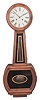 Clocks- 2 (Two): (1) Howard-inspired wall clock, 8 day, time and strike, spring driven movement in a stained hardwood case with painted metal dial, c1990; (2) International Time Recording Co., Endicott, New York, time recorder, 8 day, time and printed time stamp, spring driven movement in an oak case with two wall-mounted time card shelves, c1910.