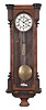 Clocks- 3 (Three) European wall: (1) Regulatorfabrik Germania, Freiburg, Germany, Vienna style regulator, 8 day, time only, weight driven movement in a walnut burl veneer case with ebonized accents, c1875; (2) Germany, box clock, 8 day, time only, weight driven movement in an ash case with enameled chapter ring, c1925; (3) France, bakery clock, 8 day, time and strike, spring driven Morbier style movement in a wood case with mother of pearl inlay and alabaster dial with enamel cartouches, c1880.