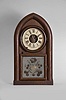 Brewster & Ingrahams, Bristol, Conn., 8 day, time and strike spring brass movement round gothic or beehive shelf clock with rack and snail strike and case iron spring barrels.