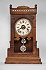 Clocks- 2 (Two): (1) Seth Thomas Clock Co., Thomaston, Conn., "Boston V.P.", 8 day, time, strike and alarm spring brass movement city series shelf clock. c1884 (2) Seth Thomas Clock Co., Thomaston, Conn., "Omaha", 8 day, time and strike spring brass movement city series shelf clock. c1894