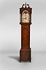New Jersey area tall case clock, 8 day, time and strike, weight driven movement in a mahogany and mahogany veneer case with a broken arch pediment, center finial, four full columns flanking hood over rectangular trunk door and base with crotch mahogany veneer. The painted metal dial has moon phase, seconds bit and calendar.
