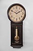 Ansonia Clock Co., New York, "Standard Regulator" wall clock with a weight driven 8 day timepiece movement in a darkly finished mahogany case.