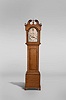 Edward S. Moulton, Rochester, New Hampshire tall clock, 8 day, time and strike, brass weight driven movement in a New Hampshire cherry case with ebonized highlights, broken arch top with carved rosettes, brass finials and straight bracket feet, Roman numeral painted metal dial with seconds bit and calendar
