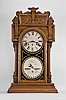 Waterbury Clock Co., Waterbury, Conn., "Calendar No. 43", 8 day, time and strike spring brass movement double dial shelf clock.