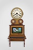 Michael Paul, Berea, Ohio, 30 hour, wagon spring brass movement miniature timepiece copy of a Joseph Ives Brooklyn model shelf clock with a shelf. This example is number 3 of 43.