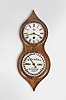 Michael Paul, Berea, Ohio, miniature reproduction, 30 hour, spring driven, pendulum movement with a working Mix Brothers calendar, copy of a Seth Thomas "Office Calendar No. 3" often called "Peanut" double dial calendar clock. This example is number 3 of 26.