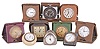 Desk and travel clocks- 10 (Ten), 30 hour and 8 day, Swiss and American, makers including Waltham, New Haven, Majestic, Junghans, and others, most with folding, leather bound cases, one desk clock with molded celluloid case and white enamel dial advertising the Lady Racine watch, another with gunmetal case and easel back, and more