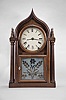 Brewster & Ingraham, Bristol, Conn., 8 day, time and strike brass spring brass movement four column O.G. Gothic or onion top shelf clock.