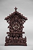 Attributed to Johann Baptiste Beha, Eisenbach, Germany, "No. 508" model shelf cuckoo, 50 hour, time and strike with calling cuckoo bird, spring driven movement in an elaborately carved case replete with foliate, vine, and fence decorations. The wooden dial with Roman numerals and white hands, all on a matching carved wall bracket. See Justin Miller's book, Appendix A, Beha Catalog 1895-1900, page 7, No. 508.