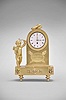 France, a small figural gilt bronze timepiece, the rectangular base with canted corners, toupie feet, with applied foliate ornament, and supporting a domed clock case with flanking figure of cupid, case top with torch and quiver, front with palmette ornamented bezel above an oval plaque before crossed torch and quiver, the plaque marked "N'oubliez Pas L'aomur", Roman numeral white enamel dial with gilt hands, and 30 hour verge fusee movement signed "Romilly Paris "