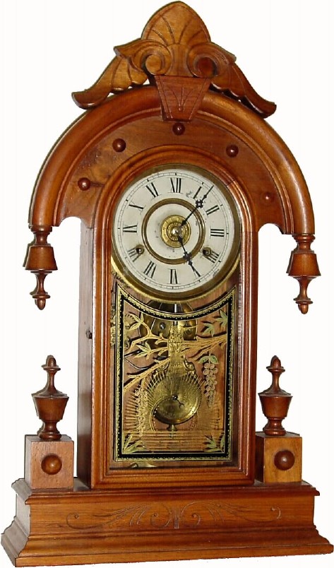 C.1880, New Haven Clock Co., "Elbe" walnut 8-day time/strike/alarm parlor clock. — Antique Clocks Price Guide